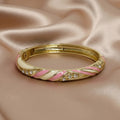 roze/witte gouden bangle armband met steentjes