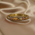 Paars- oranjekleurige gouden bangle armband
