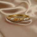 Oranje gouden bangle armband